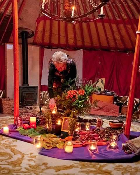 Kathy in yurt and altar